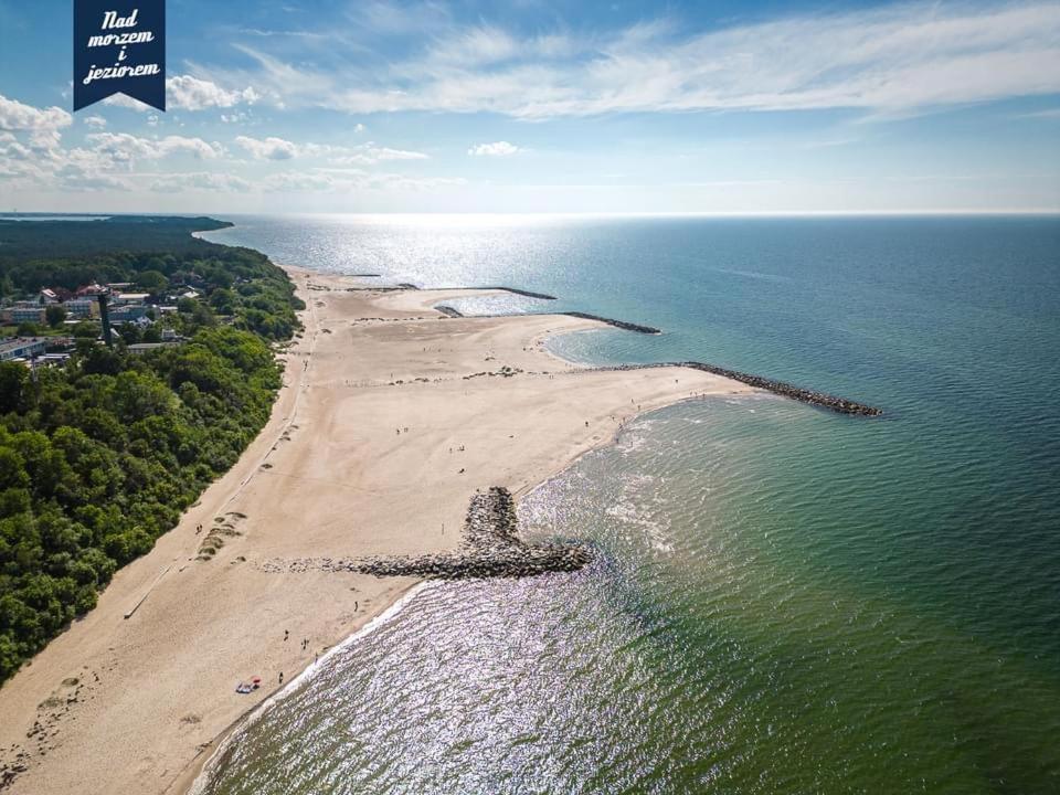Caloroczne Domki Nad Morzem I Jeziorem Jezierzany Esterno foto